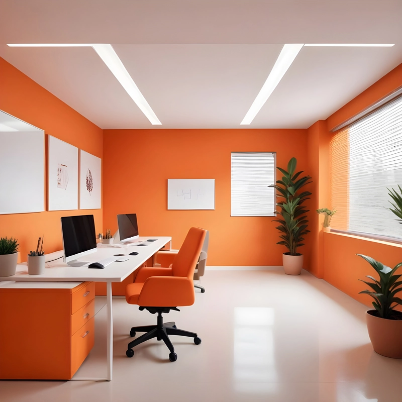 An image of an Office Space done in orange and white that can seat two workers.